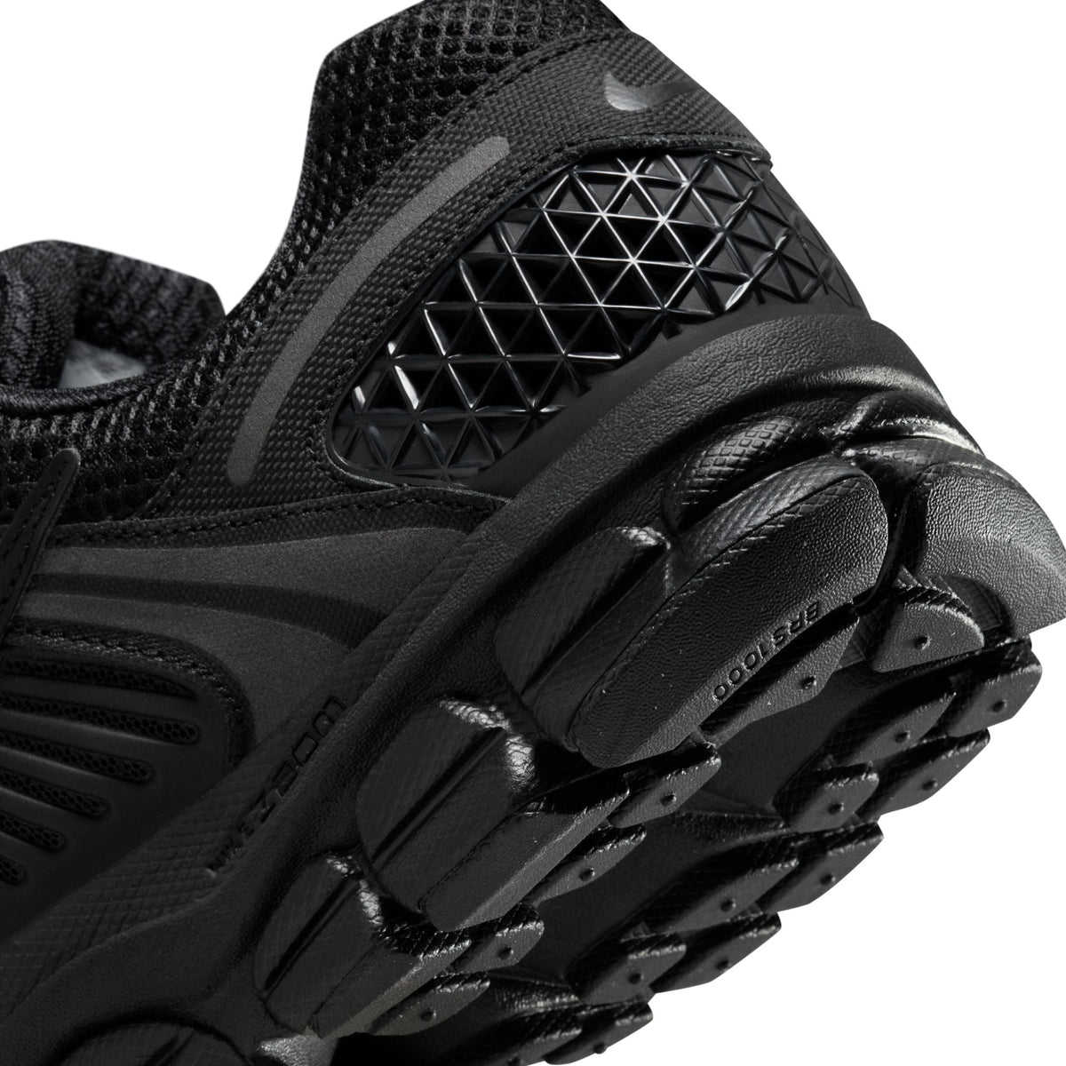 Nike men's Zoom Vomero 5 Triple Black sneakers by Denim Exchange, side view with layered mesh and black sole