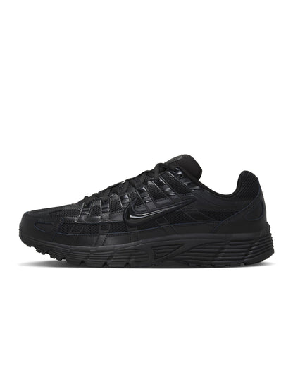 Black Nike Men's P-6000 sneakers with layered mesh and leather panels from Denim Exchange