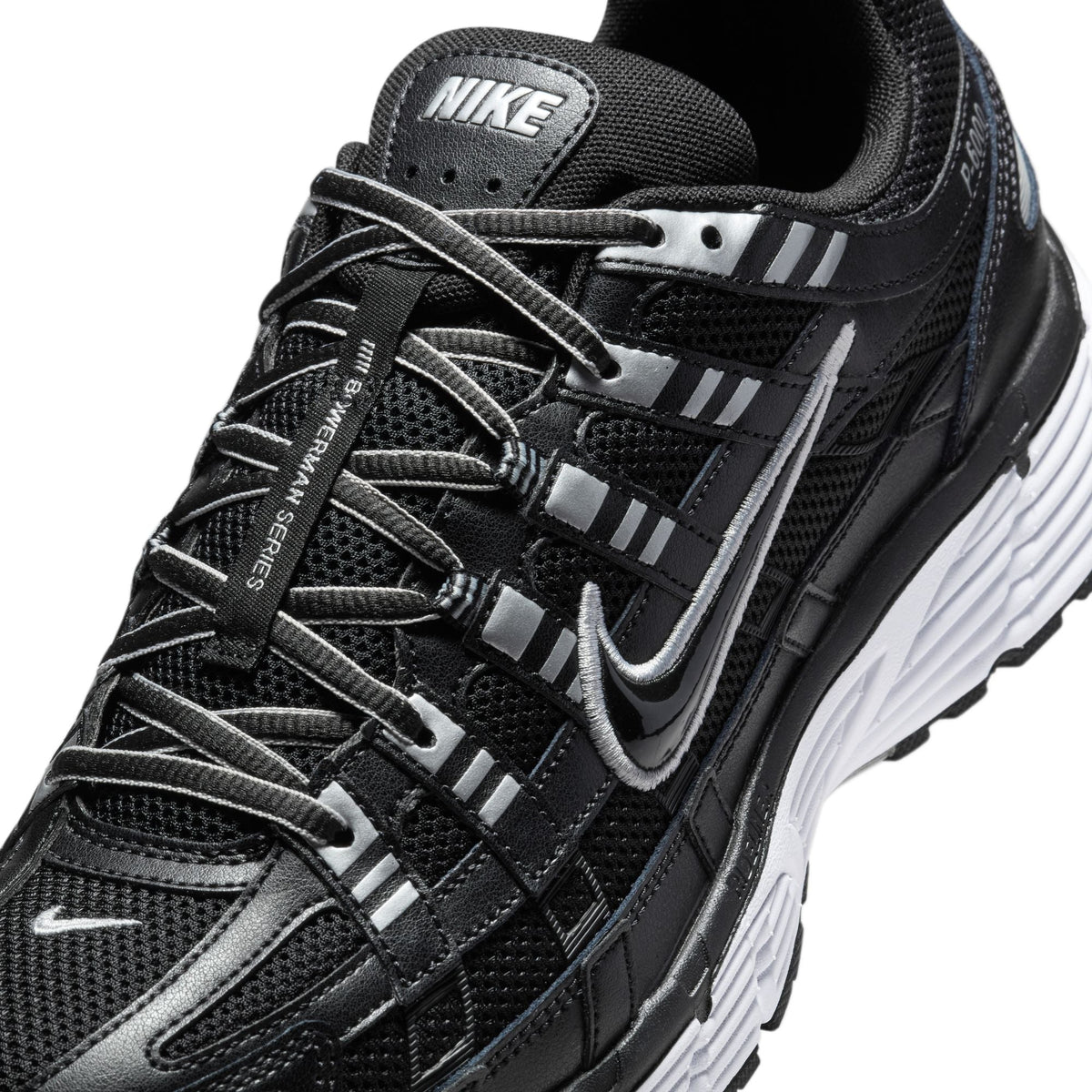 Nike men's P-6000 black sneakers by Denim Exchange.