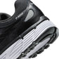 Nike men's P-6000 black sneakers by Denim Exchange, side view.