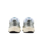Men's Nike P-6000 sneakers in white with metallic silver detailing, side view