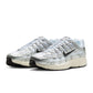 Nike men's P-6000 sneakers in white and metallic silver, side view