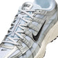 Nike men's P-6000 sneakers in white and metallic silver, side view