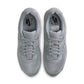 Nike men’s Air Max 90 sneakers in Wolf Grey, side view; Denim Exchange footwear product image
