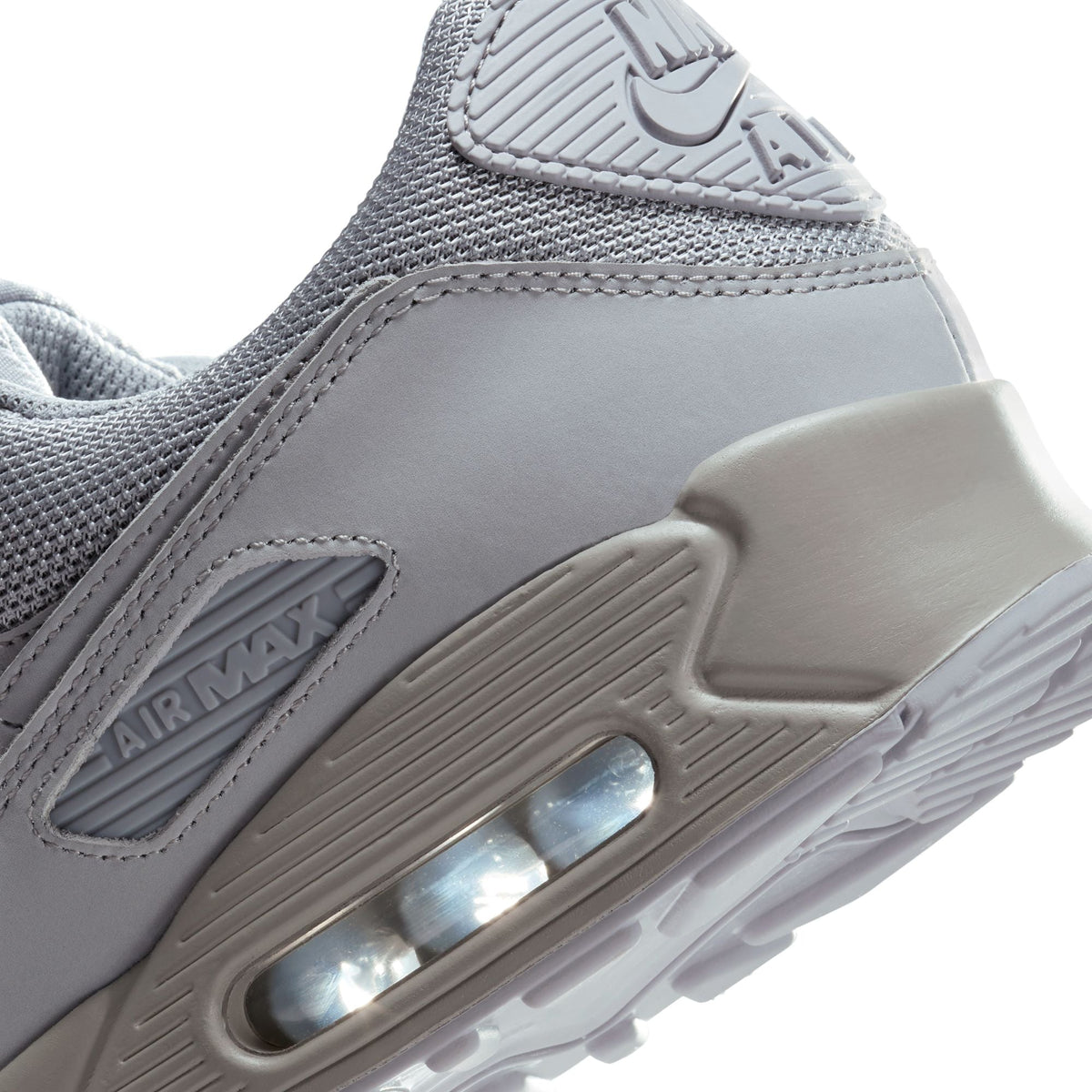 Nike men's Air Max 90 sneakers in Wolf Grey, side view