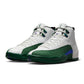 Men's Air Jordan 12 Retro Bucks basketball shoes in red and white leather, displayed on a neutral background.