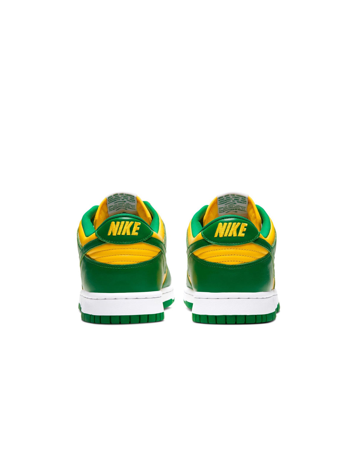 Nike Mens Dunk Low SP Pine Green sneakers in green and white leather, displayed on a plain background.