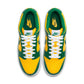 Men's Nike Dunk Low SP Pine Green sneaker in green and white leather, showcasing classic basketball shoe design.
