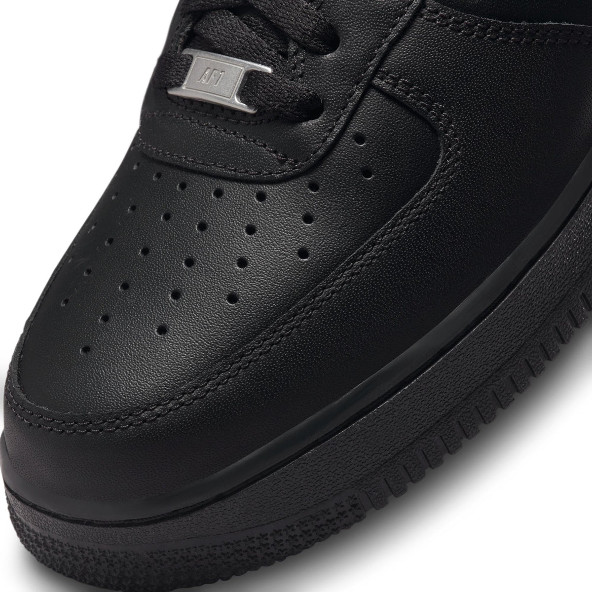 Black Nike Air Force 1 '07 men's sneakers, side view with classic low-top design and white Air branding on tongue