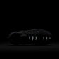 Nike Women's Air Vapormax Plus black and anthracite running shoes with breathable mesh and responsive Air sole, showcased in profile.