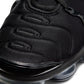Nike Womens Air Vapormax Plus black-anthracite athletic footwear with visible Air cushioning and sleek design.