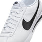 Nike men's Cortez white and black sneakers, side view with classic low-top design