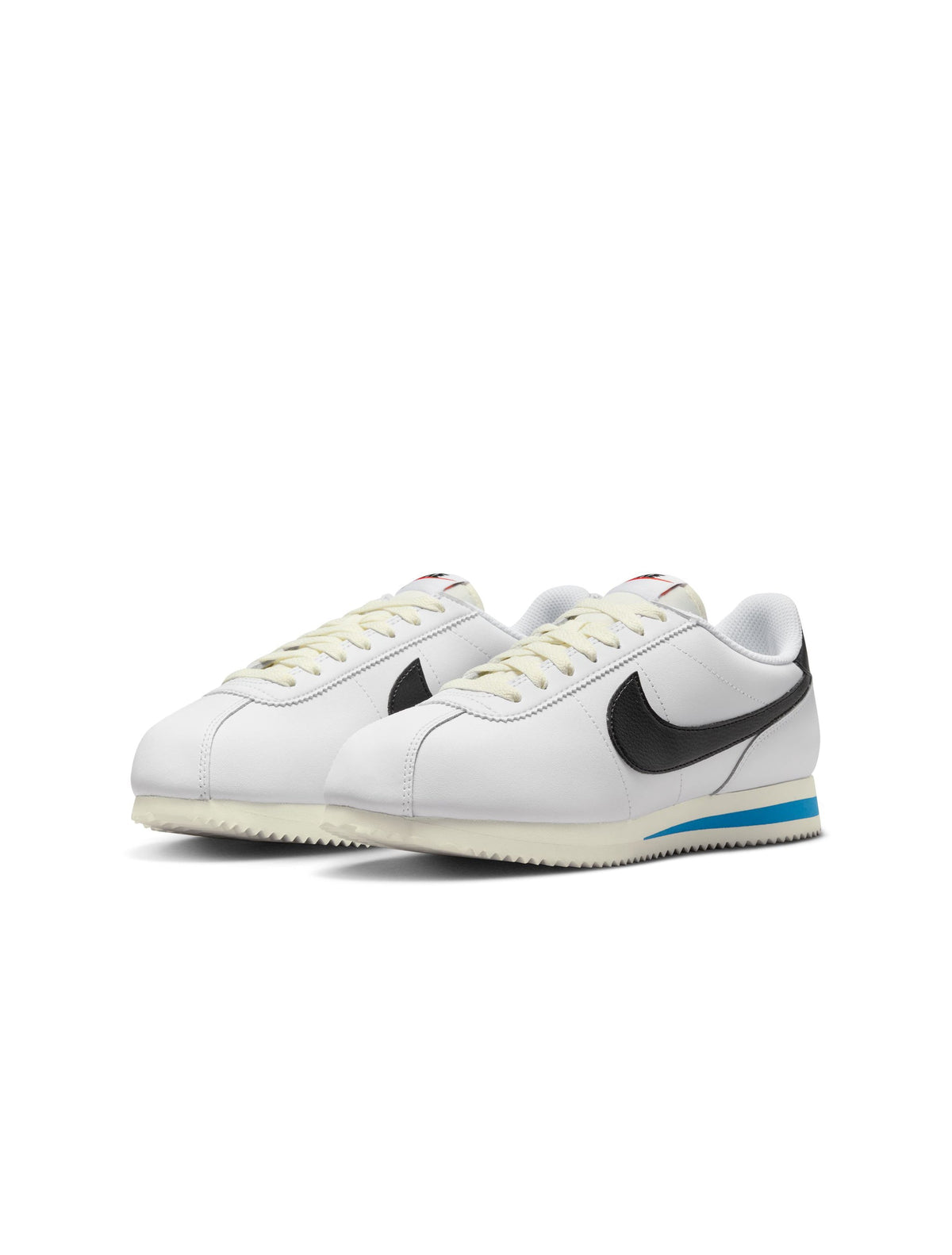 Nike Womens Cortez Leather sneakers in white and black, featuring classic design and leather material, perfect for casual wear.