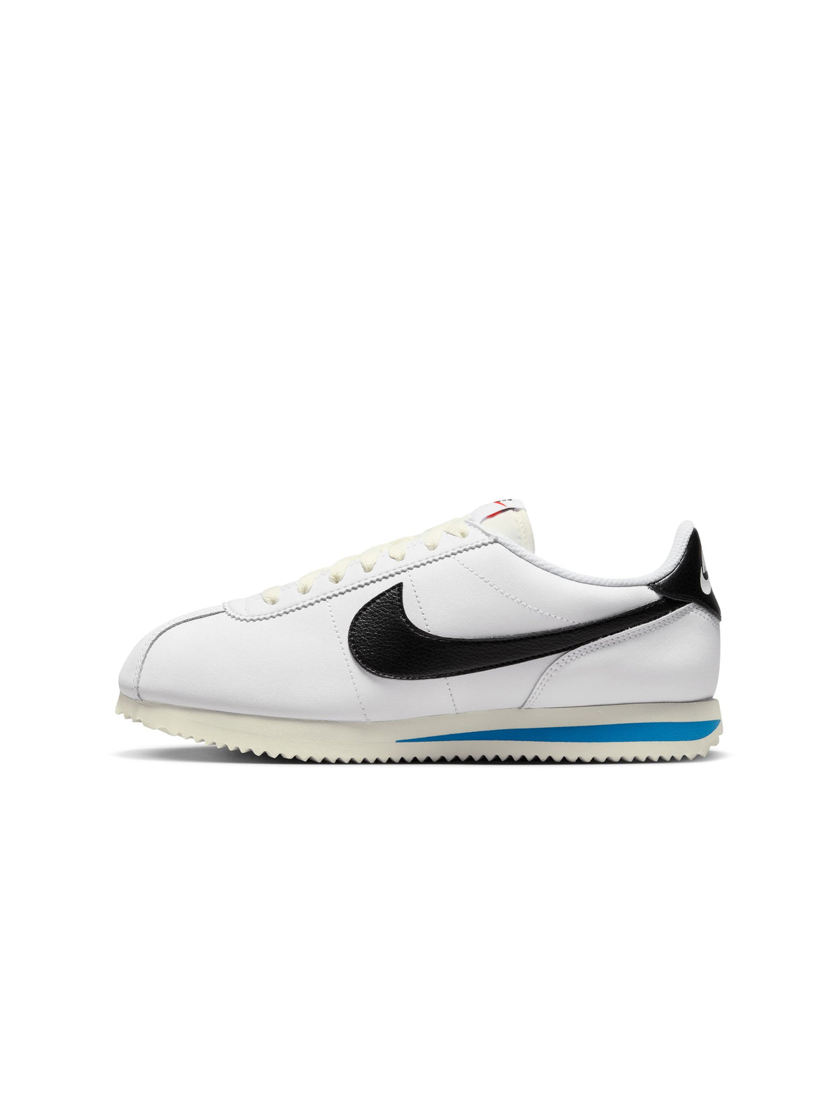 White and black Nike women's Cortez leather sneakers featuring classic design and comfortable fit, shown from a side view.