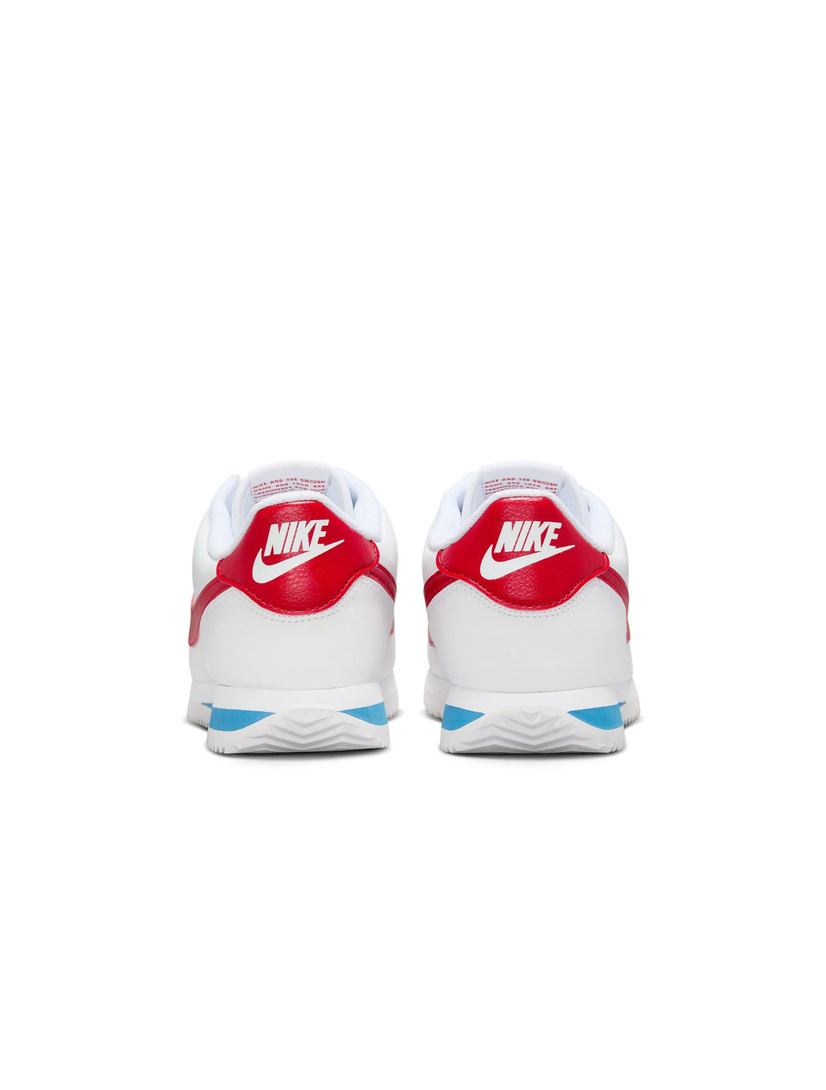 Nike Womens Cortez Leather Forrest Gump sneakers with white leather and classic style, shown on a plain background.