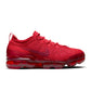 Denim Exchange men's Nike Air VaporMax 2023 Flyknit sneakers in Track Red with cushioned sole