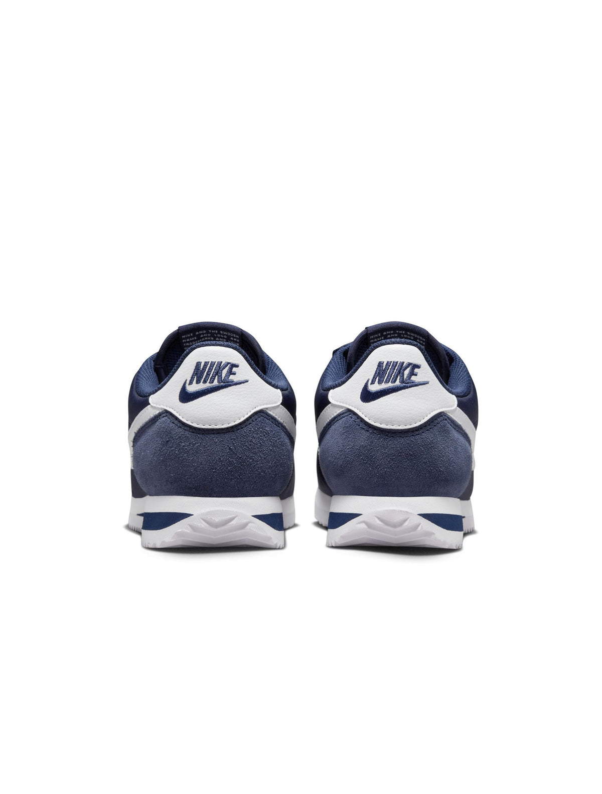 Nike Women's Cortez Midnight Navy sneakers, denim exchange footwear, featuring classic design and navy blue color.