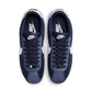 Nike Womens Cortez Midnight Navy sneakers featuring white soles and navy blue fabric, styled for casual wear.