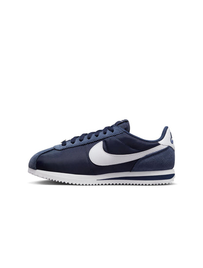 Nike women's Cortez sneakers in Midnight Navy, showcasing classic design and navy blue color, perfect for casual wear.