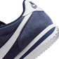 Nike Womens Cortez Midnight Navy athletic shoes with white soles and navy laces, designed for casual and athletic wear.