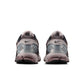 Nike men's Zoom Vomero 5 running shoes in college grey, featuring breathable mesh and cushioned sole for comfort.