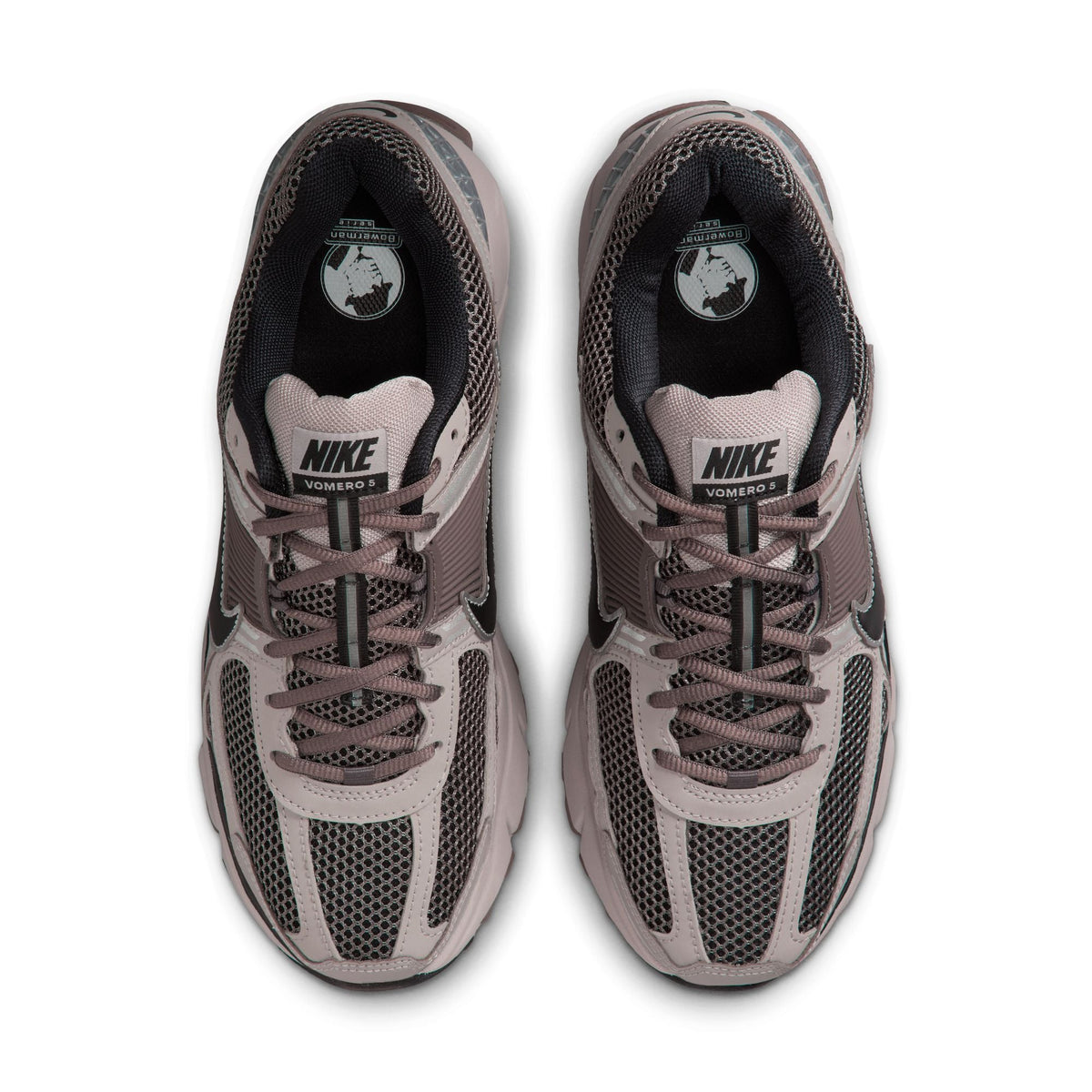 Men's Nike Zoom Vomero 5 running shoes in College Grey with white accents, featuring breathable mesh and cushioned sole.