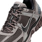 Nike men's Zoom Vomero 5 running shoes in college grey with white accents, featuring breathable mesh and supportive cushioning.