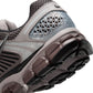 Nike men's Zoom Vomero 5 running shoes in college grey, athletic footwear with a sleek design and supportive sole.