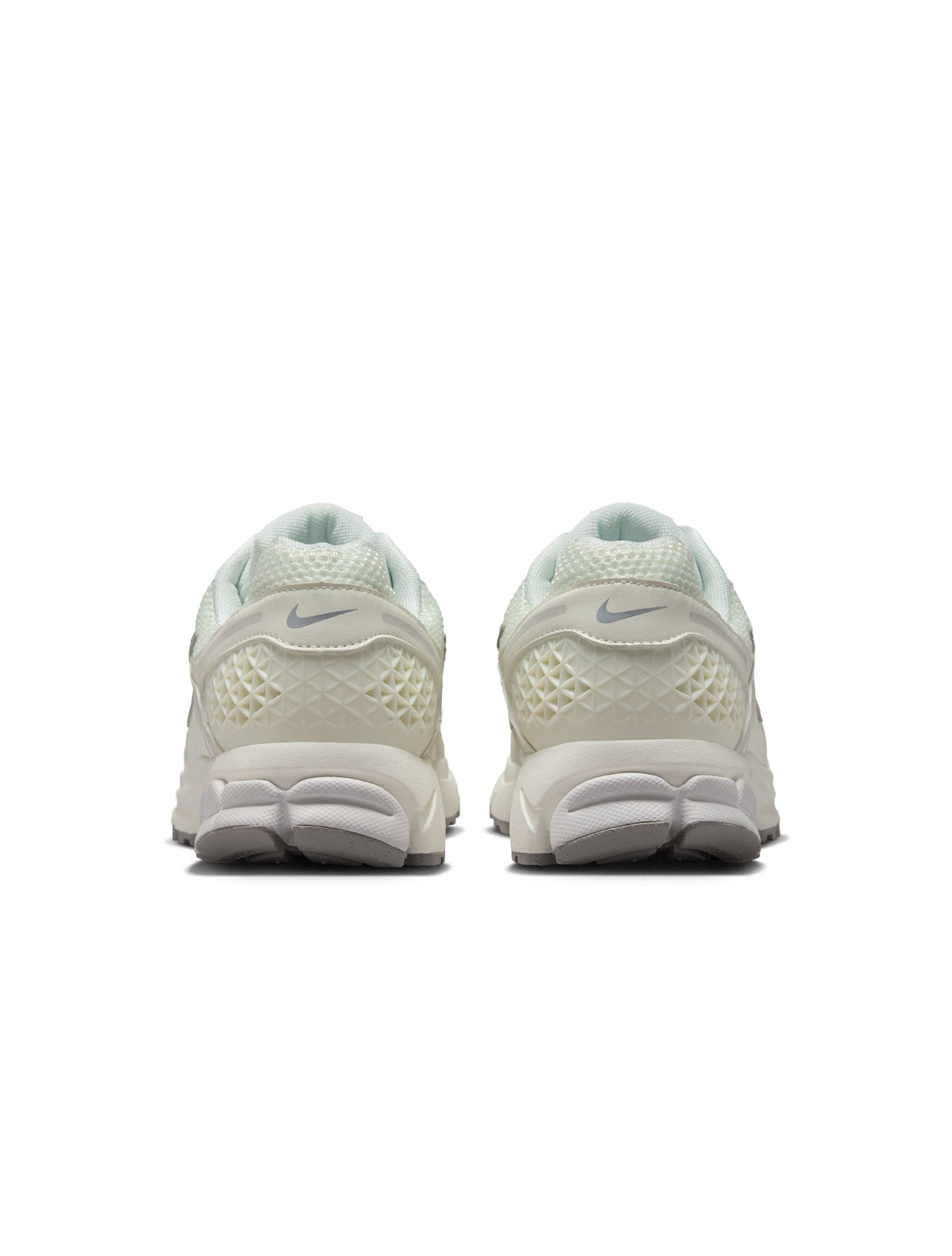 Nike Men's Zoom Vomero 5 sneakers in Sail, side view with layered mesh and synthetic panels