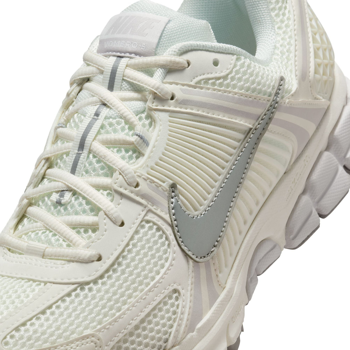 Men's Nike Zoom Vomero 5 sneakers in Sail colorway, side view.
