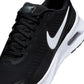 Nike Mens Air Max Nuaxis sneakers in black and white, showcasing the sleek design and athletic style of the Nike footwear.