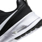 Nike Mens Air Max Nuaxis black and white athletic shoes featuring breathable mesh and cushioned soles for comfort.