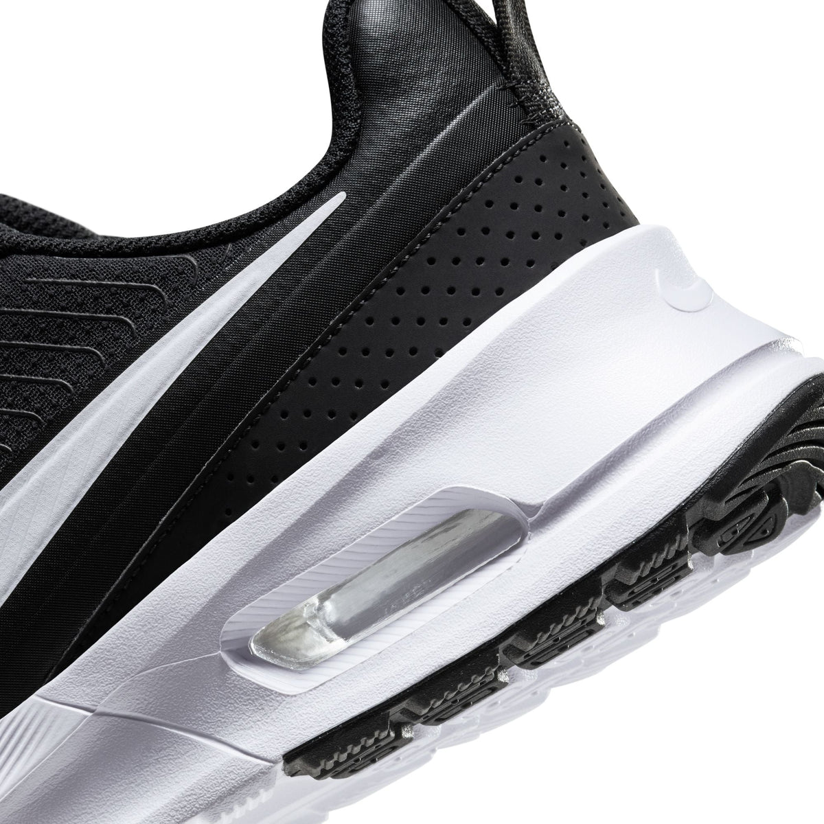 Nike Mens Air Max Nuaxis black and white athletic shoes featuring breathable mesh and cushioned soles for comfort.