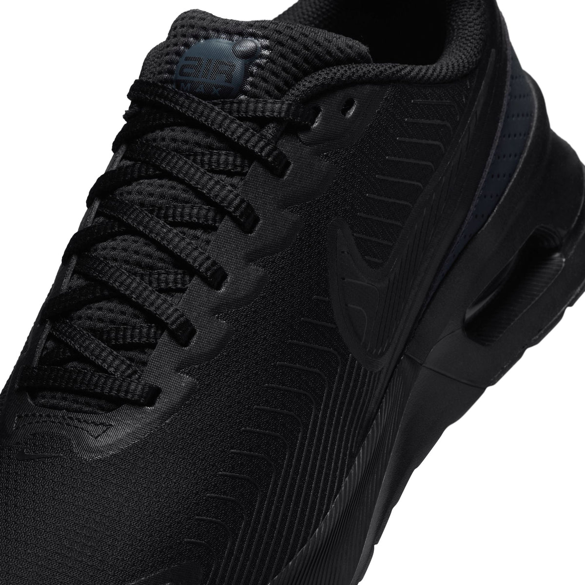 Black Nike Air Max Nuaxis men's footwear featuring sleek design and visible Air Max cushioning for comfort and style.