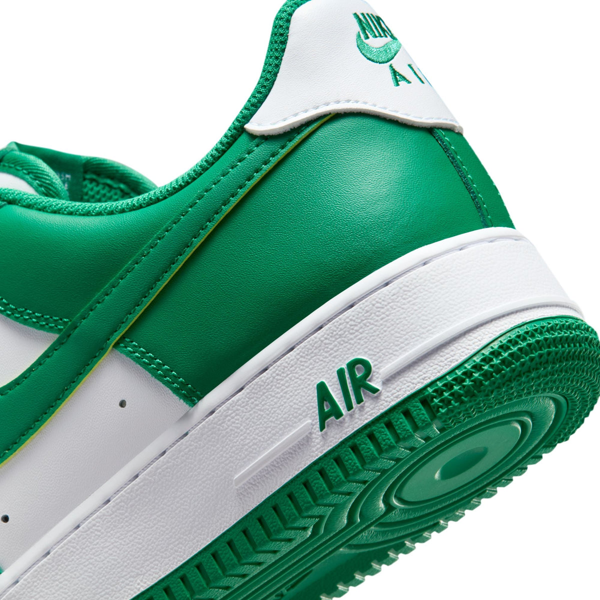 Nike Men's Air Force 1 ’07 white and Malachite sneakers, side view