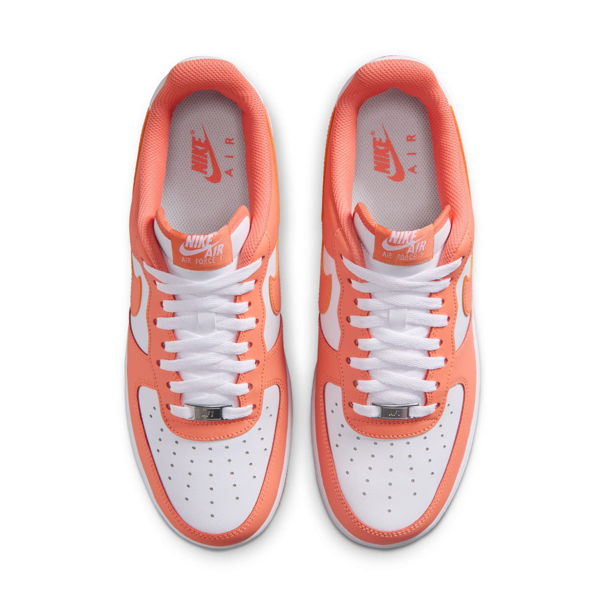 Nike Men's Air Force 1 '07 sneakers in Orange Frost color, shown from the side with white midsoles and orange accents.