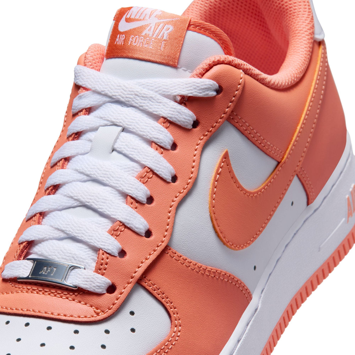Nike Men's Air Force 1 '07 Orange Frost sneakers, versatile footwear with orange frost colorway and classic design.