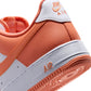 Nike Mens Air Force 1 '07 Orange Frost sneakers, casual footwear with orange and white colorway, featuring Nike branding and classic design.
