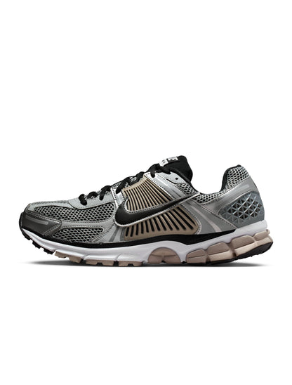 Nike men's Zoom Vomero 5 sneakers in metallic silver, side view, by Denim Exchange