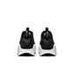 Nike Womens Free Metcon 6 black and white athletic shoes with supportive design for women, displayed on a plain background.
