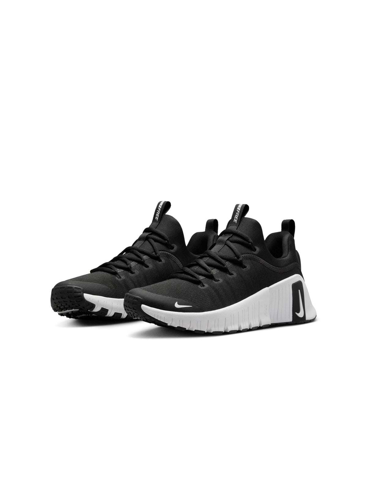 Nike Womens Free Metcon 6 black and white athletic footwear with sleek design, suitable for workout and training.