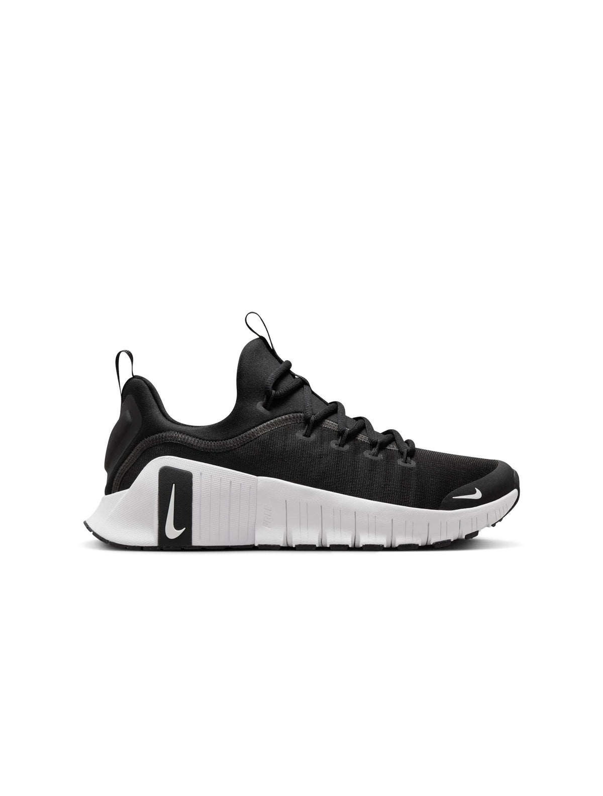 Nike Women's Free Metcon 6 athletic shoes in black and white, showcasing lightweight design and sporty style.