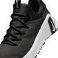 Nike Womens Free Metcon 6 black and white athletic footwear, showing the sleek design and lightweight construction.