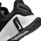 Nike Women's Free Metcon 6 athletic shoes in black and white, designed for versatile training and performance.