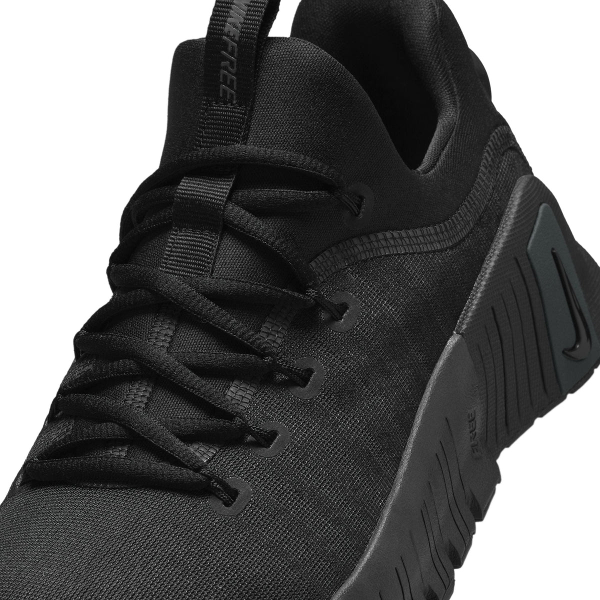 Nike Women's Free Metcon 6 black and anthracite athletic shoes, showcasing lightweight design and supportive soles for women.