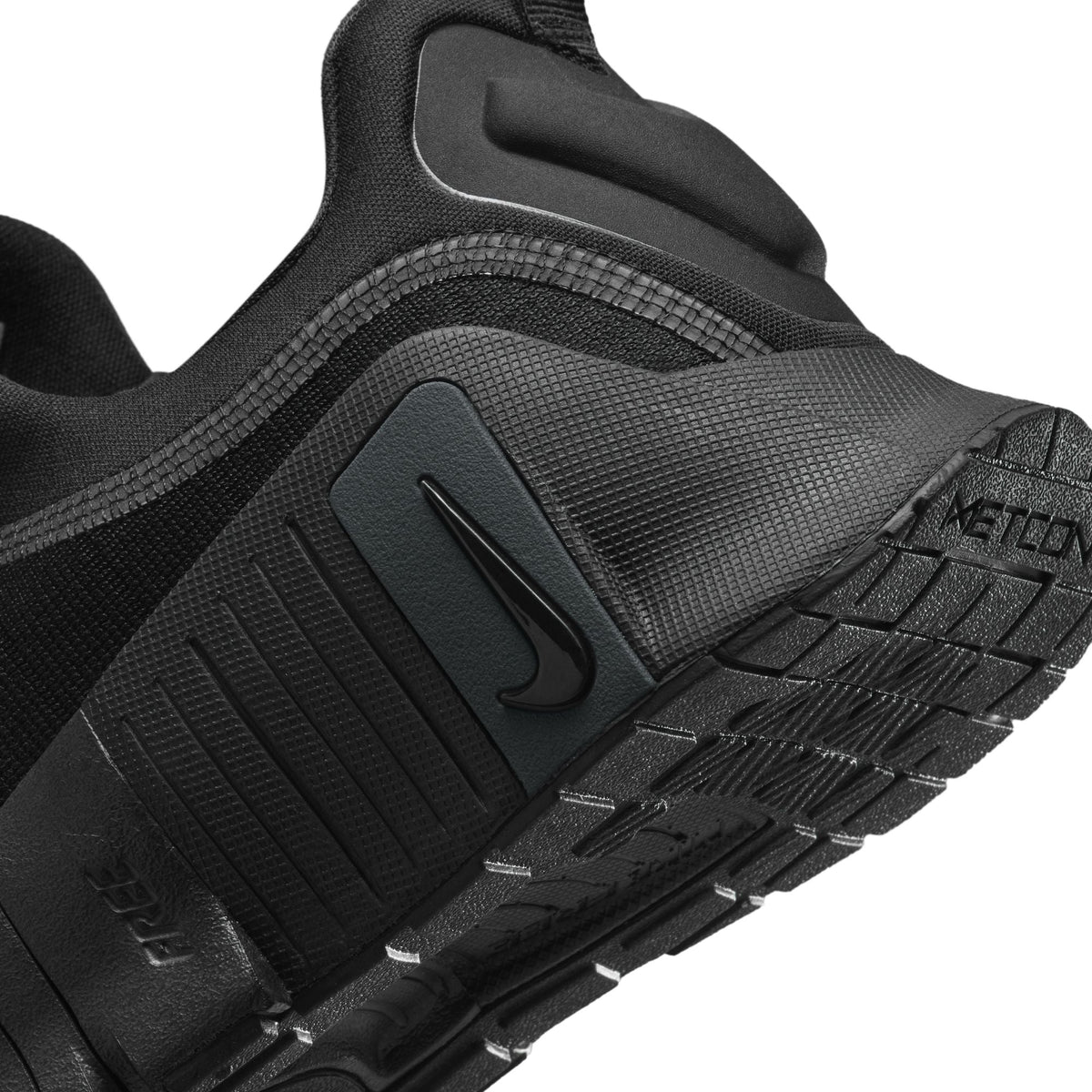 Nike Women's Free Metcon 6 athletic shoes in black and anthracite color, designed for training and fitness activities.