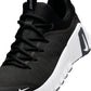 Nike Men's Free Metcon 6 black and white training shoes, side view, by Denim Exchange
