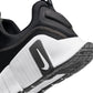 Nike Men's Free Metcon 6 black and white training shoes, side view.