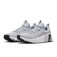 Nike Men's Free Metcon 6 shoes in Wolf Grey, side view with breathable mesh upper and cushioned sole
