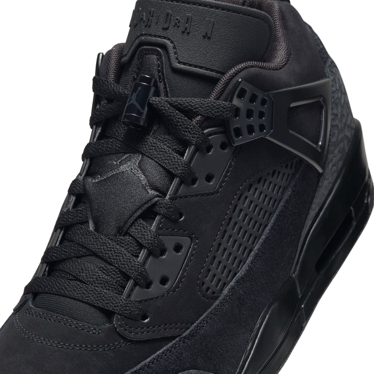 Air Jordan Men's Spizike Low black sneakers, side view with low-top design and visible Jordan detailing